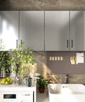 Kitchen with cabinets covered in Stainless Steel Look Self Adhesive Contact Paper Peel And Stick Vinyl Wrap For Fridges And Appliances