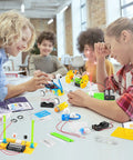 Children working on Hands On 11 Project STEM Kit For Kids Aged 8 9 10 11 12 13 14 Explore Physics And Engineering With Robot Building Experiments