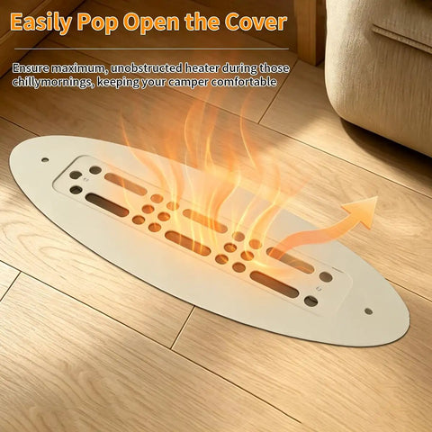2x10 Inch Aluminum RV Floor Vent Cover With Magnet Assisted Removable Lid releasing warm air in khaki finish on wooden floor