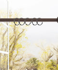 Heavy Duty Zinc Alloy Shower Curtain Rings Set, Black Hanging Hooks With Smooth Glide O Rings on a window curtain rod