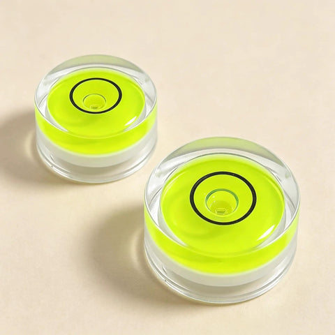 5Pcs Small Circular Bubble Levels with Double Sided Adhesive, mini green levels in clear casing, 15mm diameter, two pieces shown.