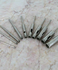 Powerhouse 10 Piece Premium Diamond Hole Saw Kit For Slicing Tile Glass Marble Granite Like Warm Butter With One Eighth Straight Shank, set of tools on marble.