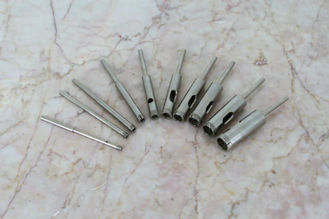 Powerhouse 10 Piece Premium Diamond Hole Saw Kit For Slicing Tile Glass Marble Granite Like Warm Butter With One Eighth Straight Shank, set of tools on marble.