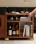 Wooden trolley with books and bottles on 4 Piece Brass Stem Furniture Casters Set With Universal 360 Degree Swivel Wheels