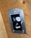 Inside Install Roof Flange For Pipe Flashing No Climbing Needed Works With Architectural And Conventional Shingles Handles Flat To 12 To 12 Pitch All Weather Install Even In Snow Patented Leak Proof Roofing Solution, shown installed on wooden roof from inside.