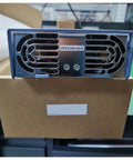 Rock Solid Compact Din Rail Power Supply For Industrial Automation And Communications Gear, showing rear view with vent design.