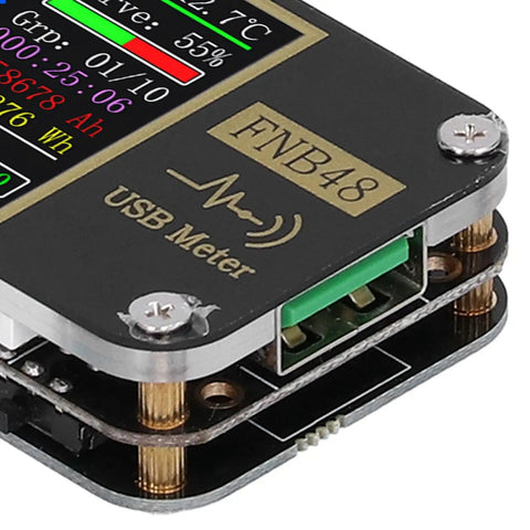 Close-up of High Precision USB Voltmeter And Ammeter With Color LCD Screen showing real-time data and USB port.