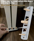 Sliding Closet Door Floor Guide Kit Compatible With Prime-Line N 6560, showing installation with brown nylon tips on wood floor