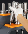 Heavy Duty Steel Workbench With Smart Storage Cabinet And Wall Pegboard For Garage Tools, showcasing a hand placing a tool.