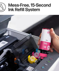 Close-up of a person refilling an ink tank in a Refillable Ink Tank All-In-One Printer With Wireless, Scanner And Copier, Cartridge-Free Ink System, AI Enabled, No-Hassle Setup, 2 Years Of Ink Included, Built For Home Use And High-Volume Printing.