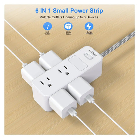 Badass Us Plug Ac Outlet Multitap Power Strip With Five Ft Extension Cord and Heavy Duty Surge Protector positioned on wooden surface.