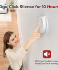 Girl using one-click silence feature on Hardwired Smoke And Carbon Monoxide Alarm With Battery Backup Smart Dual Sensor Guard.
