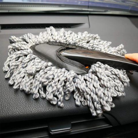 Using Six Pack Car Detailing Kit With Scratch Free Interior Duster on car dashboard
