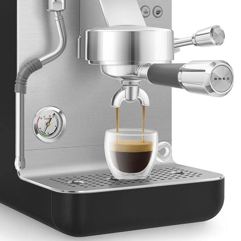 Next Level Semi Pro Espresso Machine Featuring 15 Bar Pump Pressure And Triple Thermoblock Heating For Rock Solid Temp Control And Strong Steam Wand Pulling Real Deal Barista Shots Daily In Glossy Black with espresso pouring into a glass.