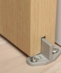Sliding Barn Door Bottom Floor Guide With T Shape Design, silver, installed on wood floor, stabilizing wooden door.