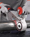 Heavy Duty 1100 Watt Pipe Belt Sander Built For Gritty Metal Pipe Grinding And Steel Polish Jobs With Six Adjustable Speeds For Crisp Clean Finishes Fast in use on metal pipe.