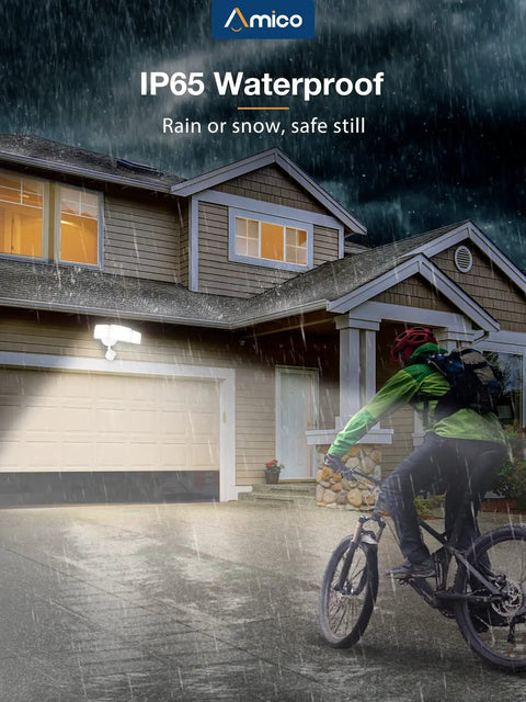 Cyclist in rain with 40W Remote LED Security Light With Motion Sensor, 4000 Lumens on house, IP65 Waterproof Outdoor Lighting