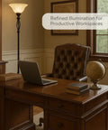 Bronze Floor Lamp With Glass Alabaster Swirl Amber Shade in office beside desk and chair, providing cozy vibe glow and soft glare.