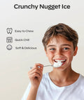 Smiling person enjoying soft nugget ice made by Countertop Nugget Ice Maker Delivers Soft Pebble Ice In Minutes, 33 Lbs Per Day.
