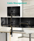 Kick Up Your Desk Game With This Stacked Quad Monitor Mount For 13 To 27 Inch Led Lcd Screens Holding 22 Pounds Per Arm And Keeping Things Clean A Real Space Saving Flex Right Now, showing cable management with four monitors.