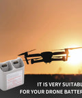 Two Way Charger With Storage For Neo Battery, 45W Rapid Dual Charging Hub next to silhouette of drone at sunset