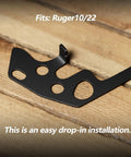 Steel Drop-In Auto Release Plate Replacement Upgrade Kit for 10-22 Rimfire Rifles on wooden surface