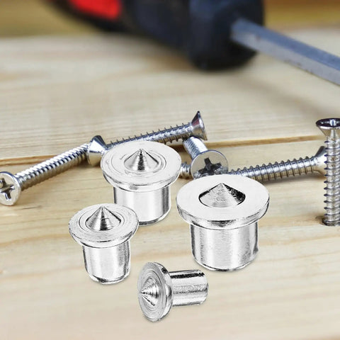Pro Grade Stainless Steel Dowel Pin Set for Woodworking Alignment next to screws and screwdriver on wooden surface