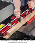 Heavy Hitting 48 Inch Precision Taper Jig For Table Saw with MDF sled, adjusting clamps, and wood piece for precise cuts.