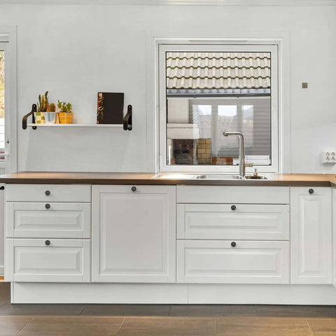 Slick Matte Black Round Cabinet Knobs Featuring A Sleek Zinc Body And Single Hole Mounting For Fresh Kitchen Drawers Or Bathroom Vanities Straight Up Pro Grade Durability With A Tight Fit Set Of 10 on white kitchen cabinetry.