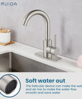 Single Hole Bathroom Faucet With 360 Degree Swivel Spout, 304 Stainless Steel, Brushed Nickel Finish on a kitchen sink
