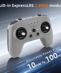 Gray T8L ELRS 2.4GHz Radio Transmitter With Hall Effect Gimbals shown with shadow on blue background, front-facing view
