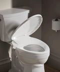 Manual Dual Wand Bidet Toilet Seat With Quiet Close Elongated Design, open on white toilet, view from side