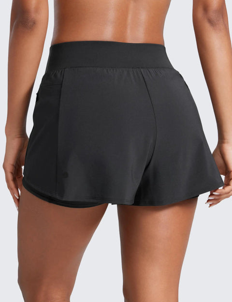 Back view of Women Running Shorts Double Layer 3 Inch High Rise 2 In 1 Built In Spandex Short with zip pockets, black, medium