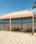 Beige 10x20 Pop Up Canopy Tent With Mosquito Netting on beach, used for shade and protection in outdoor events and camping.