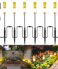 Extendable LED Pathway Lights 6 Pack Low Voltage 12V AC DC 570 Lumen Yard Walkway Driveway Landscape Lamps IP65 Waterproof 2700K Crystal Clear Transparent Bodies For Elegant Outdoor Garden Lighting.