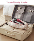 Pink Bow Pattern Hair Tools Organizer Bag for Curling Irons Flat Irons Hair Dryers and Styling Tools Portable Travel Case shown in suitcase