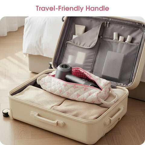 Pink Bow Pattern Hair Tools Organizer Bag for Curling Irons Flat Irons Hair Dryers and Styling Tools Portable Travel Case shown in suitcase