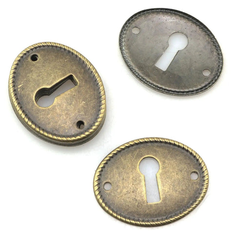 Top Tier 10 Pack Zinc Alloy Oval Keyhole Escutcheons Heavy Duty Antique Bronze Lock Covers, 3 oval plates with keyholes.