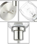 Close-up of Two Light Bathroom Vanity Light showing brushed nickel wall mount and clear glass shade.