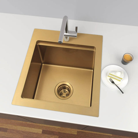 Gold Extended Sink Flange With Deep Basket Strainer installed in a kitchen sink, ideal for quartz farmhouse and stainless steel sinks.
