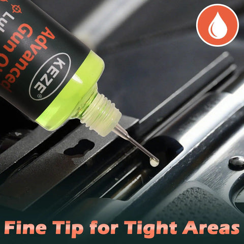 Applying 4 In 1 CLP Gun Lubricant Kit With 2 Oz Fine Mist Sprayer And 1 Oz Needle Oiler to gun metal surface
