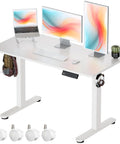 Electric Standing Desk With Adjustable Height And Memory Presets Heavy Duty Steel Base Rolling Casters For Office Gaming Home Setup 48X24 Inches White with dual monitors and accessories