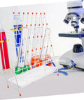 Built Tough White Metal Laboratory Bottle Drying Rack With Thirty Two Pegs For Test Tubes And Glassware holding various flasks.