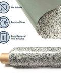 36x72 Inch Black Granite Countertop Vinyl Laminate Sheet Peel And Stick Self Adhesive Backing, Heat Resistant, Water Resistant, And Stain Resistant, Realistic Granite Look For Kitchen And Bath Remodel, showing peel and stick feature and granite texture.