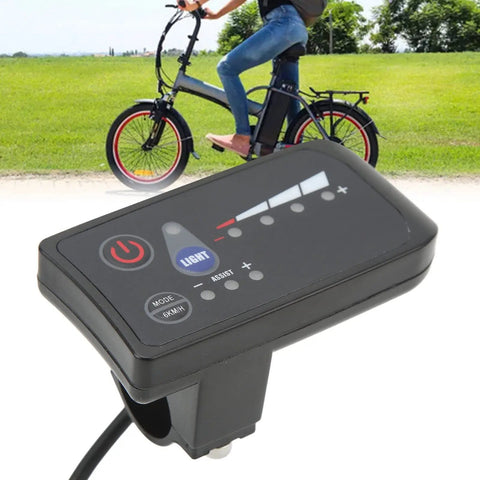 Real Time Bike Power Meter With LED Display And 5 Pin Interface, ABS Weatherproof Housing, displayed in grassy outdoor setting