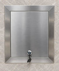 Heavy Duty Stainless Steel Drywall Access Door 28 X 28 Inch Wall Cutout Panel with rotary latch mounted in wall.