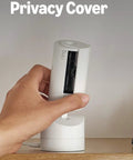 Manual privacy cover being held near the Sleek 360 Degree Pan Tilt Indoor Security Camera With Crisp Hd Video.