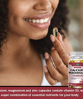 Person holding a softgel from Max Strength Calcium 1000mg With Magnesium 400mg D3 600IU And Zinc 25mg Complex bottle, 120 softgels