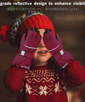 Child wearing red hat using Kids Ski Gloves Cool Warm Winter Thermal Fleece Snow Gear For Skiing And Snowboarding.