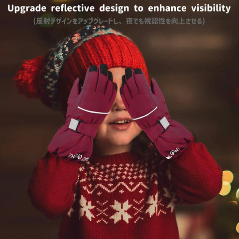Child wearing red hat using Kids Ski Gloves Cool Warm Winter Thermal Fleece Snow Gear For Skiing And Snowboarding.